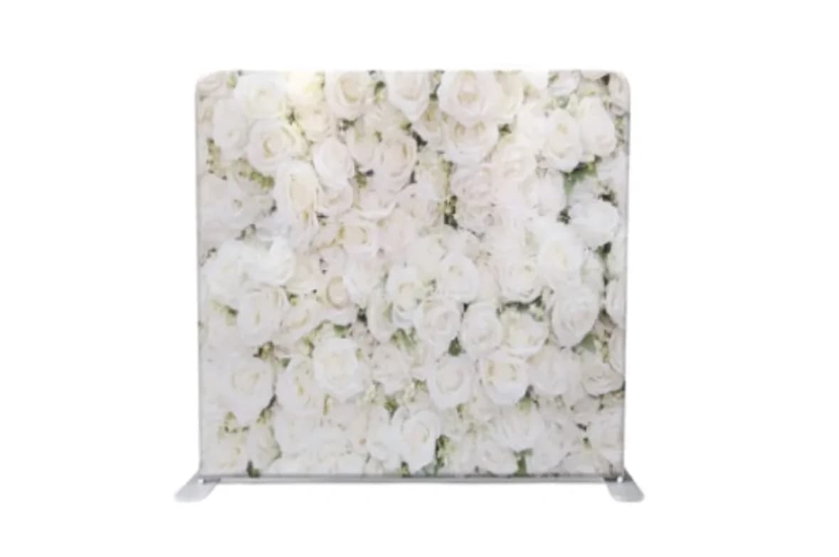 Supplier image of a flat fabric backdrop printed with white flowers on a freestanding frame